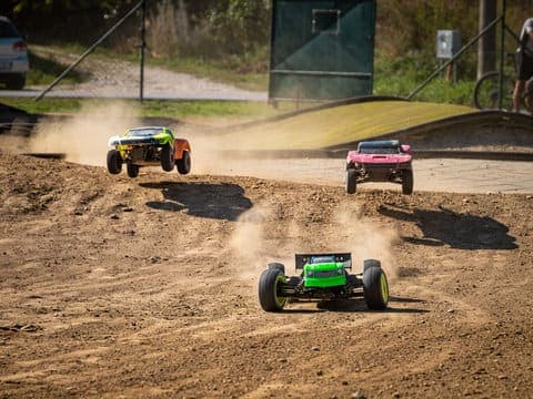 Remote control cars racing on the outdoor RC track at Dinklr, Bengaluru